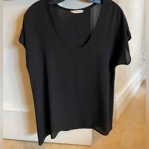Loose black blouse